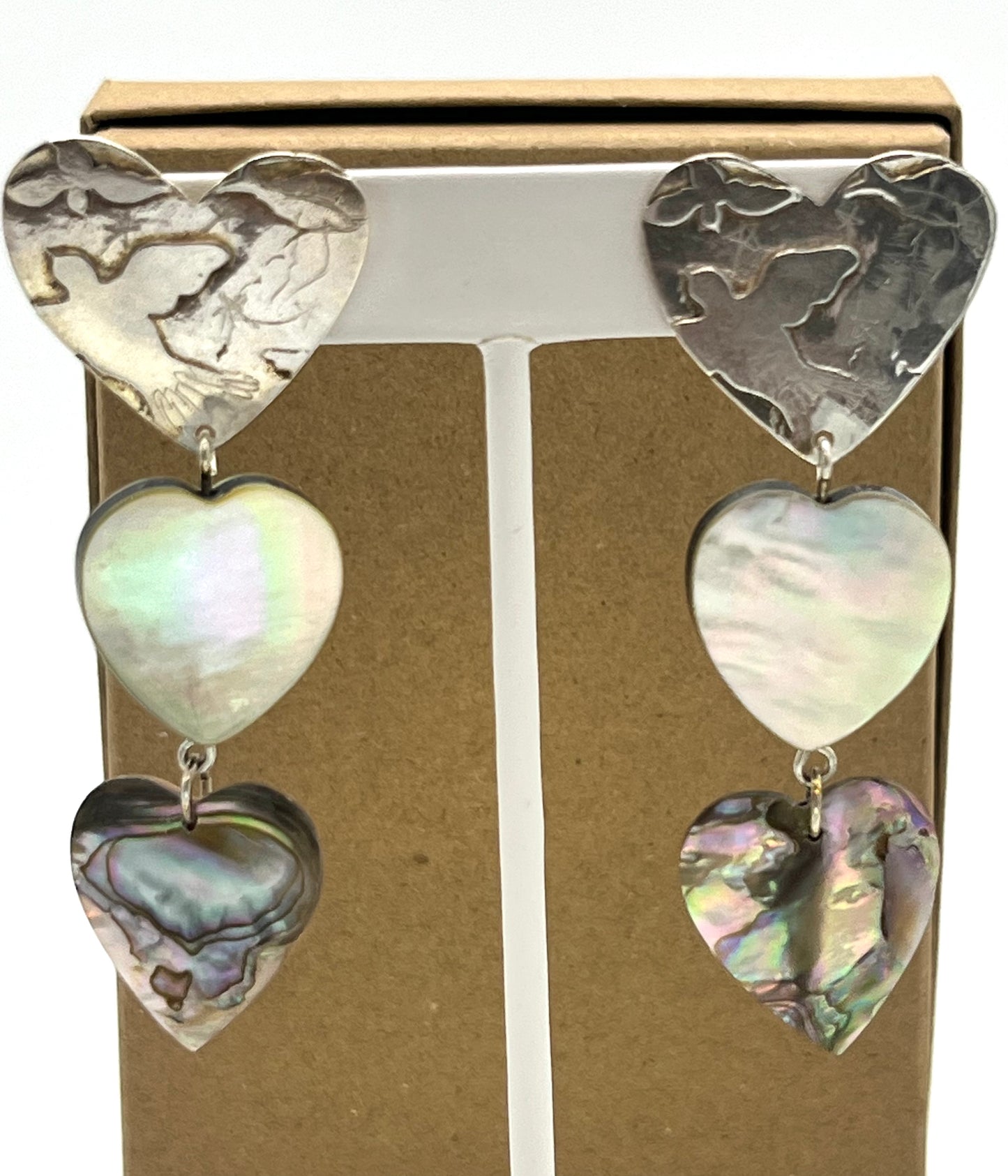 Good posture Earrings triple hearts