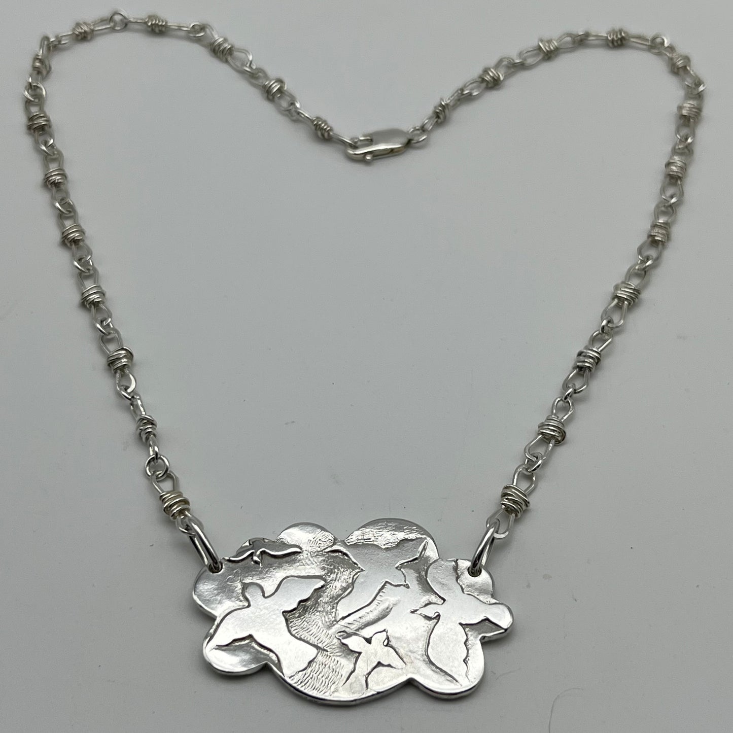 Silver Pow Pow Cloud and soft barb wire Necklace