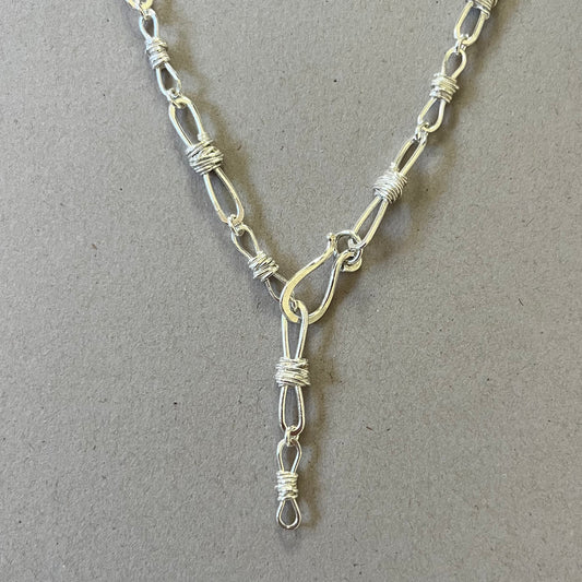 Barb wire link chain alternating small big